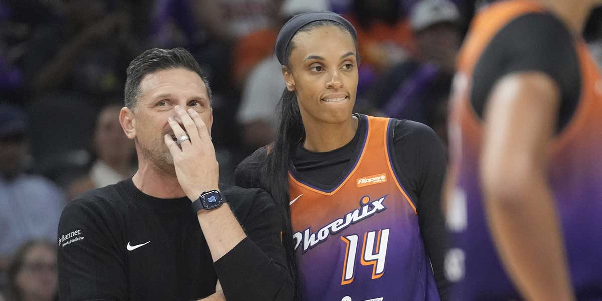 Phoenix Mercury head coach Nate Tibbetts talks with forward DeWanna Bonner (14) during the fourth quarter against the Minnesota Lynx at PHX Arena on July 9, 2025.