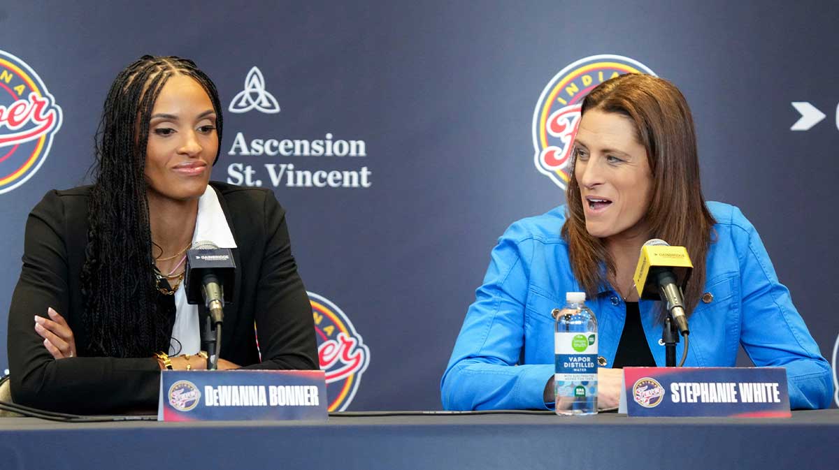Indiana Fever head coach Stephanie White (right) speaks during an introductory press conference for forward DeWanna Bonner on Monday, Feb. 10, 2025, at Gainbridge Fieldhouse in Indianapolis.