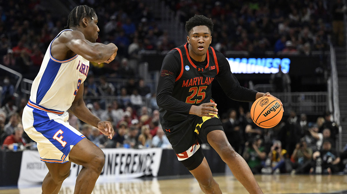 Maryland Terrapins center Derik Queen (25) dribbles down court past Florida Gators center Rueben Chinyelu (9) during the second half during a West Regional semifinal of the 2025 NCAA tournament at Chase Center.