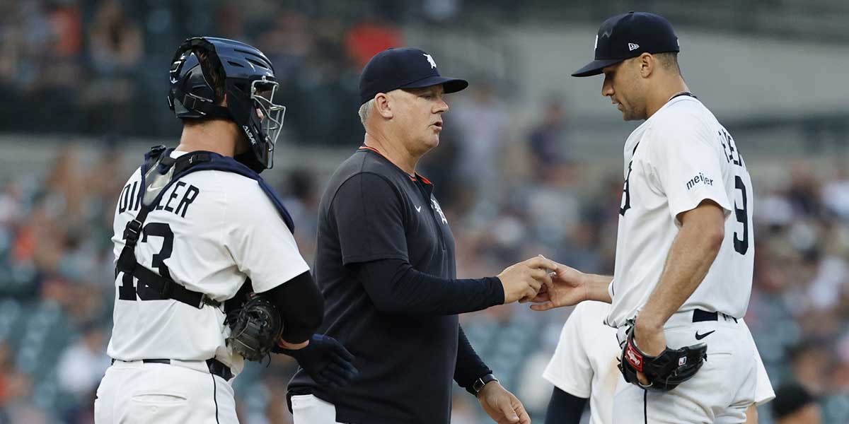 Detroit Tigers manager A.J. Hinch (14) take the ball to relieve pitcher Jack Flaherty (9) in the seventh inning against the Tampa Bay Rays at Comerica Park.