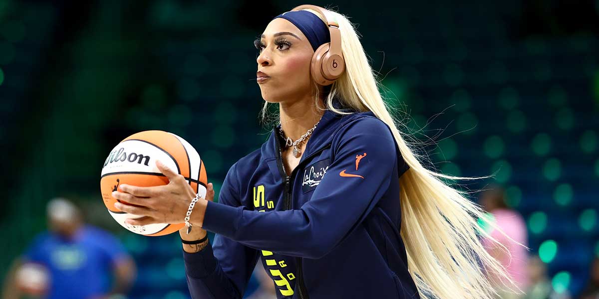 Dallas Wings guard DiJonai Carrington (21) warms up before the game against the Atlanta Dream at College Park Center.