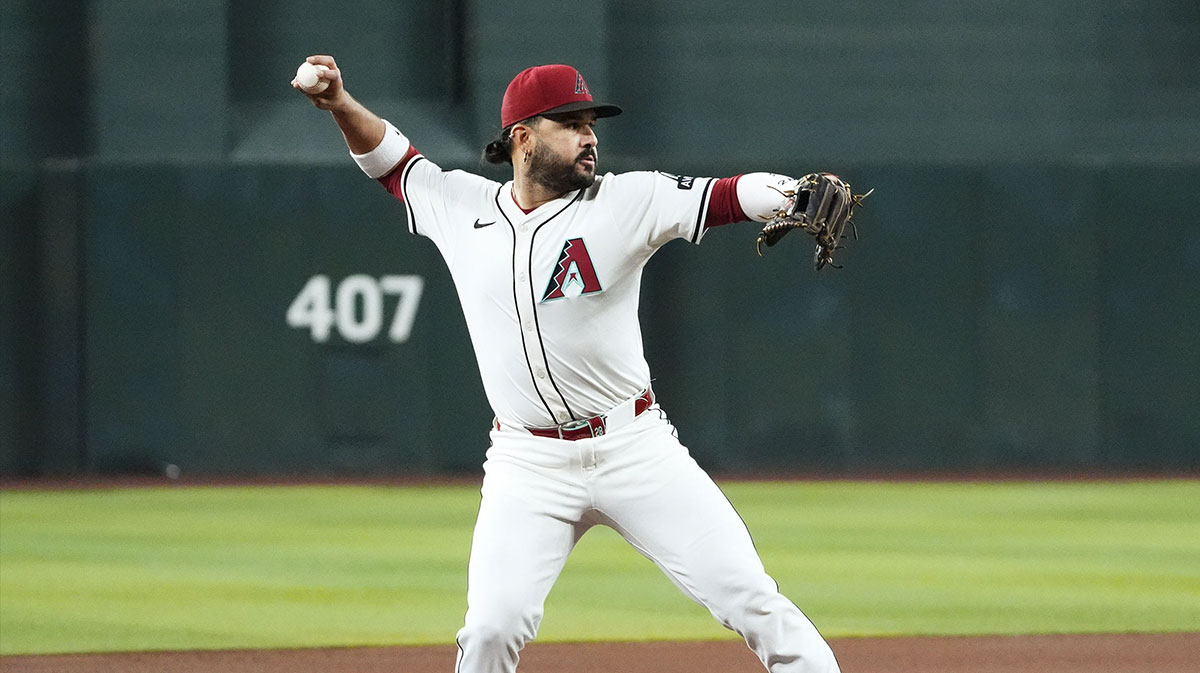 Arizona Diamondbacks third baseman Eugenio Suarez fields the ball and throws out Houston Astros' Yainer Diaz in the first inning at Chase Field.