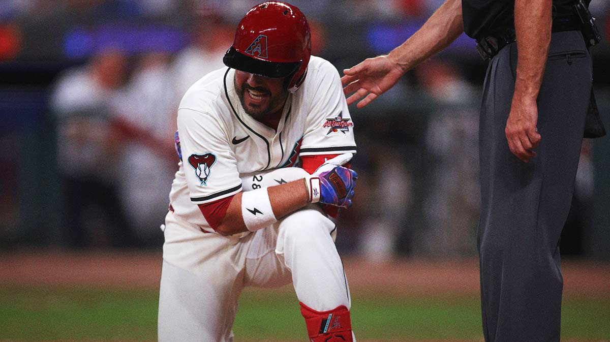 National League third baseman Eugenio Suarez (28) of the Arizona Diamondbacks reacts after getting hit by a pitch in the eighth inning during the 2025 MLB All Star Game at Truist Park.