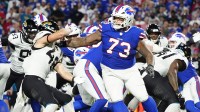 Buffalo Bills offensive tackle Dion Dawkins (73) blocks Jacksonville Jaguars linebacker Chad Muma (48) during the second half at Highmark Stadium.