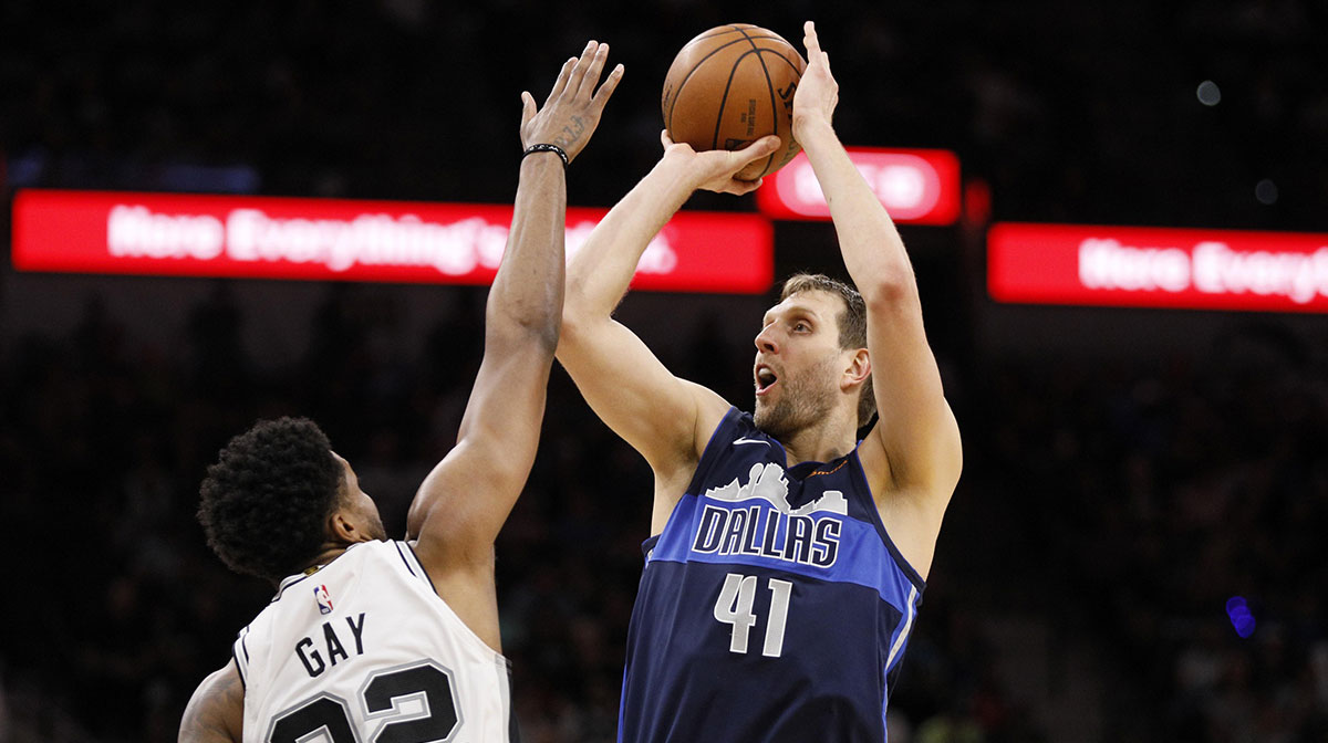 Dallas Mavericks power forward Dirk Nowitzki (41) shoots the ball over San Antonio Spurs small forward Rudy Gay (22) during the second half at AT&T Center.