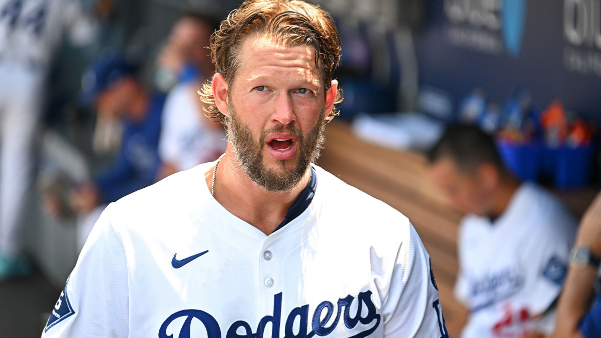 Los Angeles Dodgers starting pitcher Clayton Kershaw (22) looks on in the dugout during the third inning of the game against the Milwaukee Brewers at Dodger Stadium.