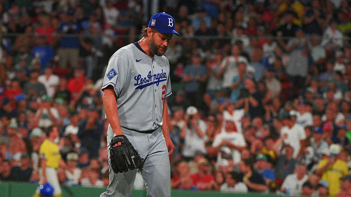 Los Angeles Dodgers starting pitcher Clayton Kershaw (22) walks to the dugout after being relieved during the fifth inning against the Boston Red Sox at Fenway Park.