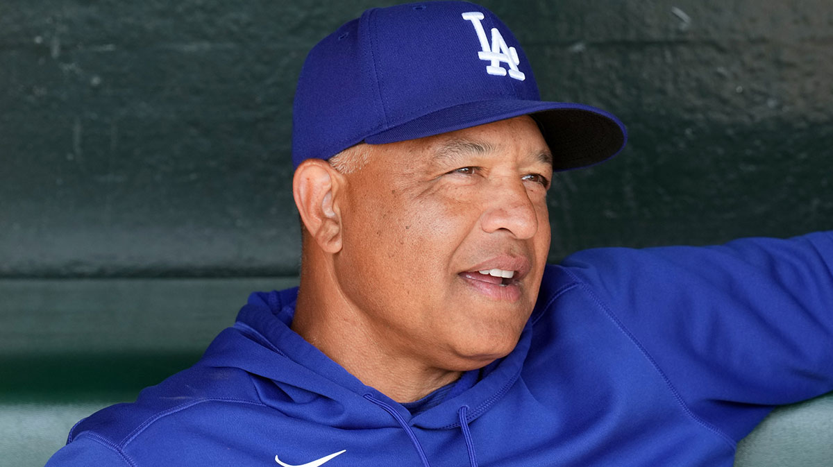 Los Angeles Dodgers manager Dave Roberts (30) sits in the dugout before the game against the San Francisco Giants at Oracle Park. 