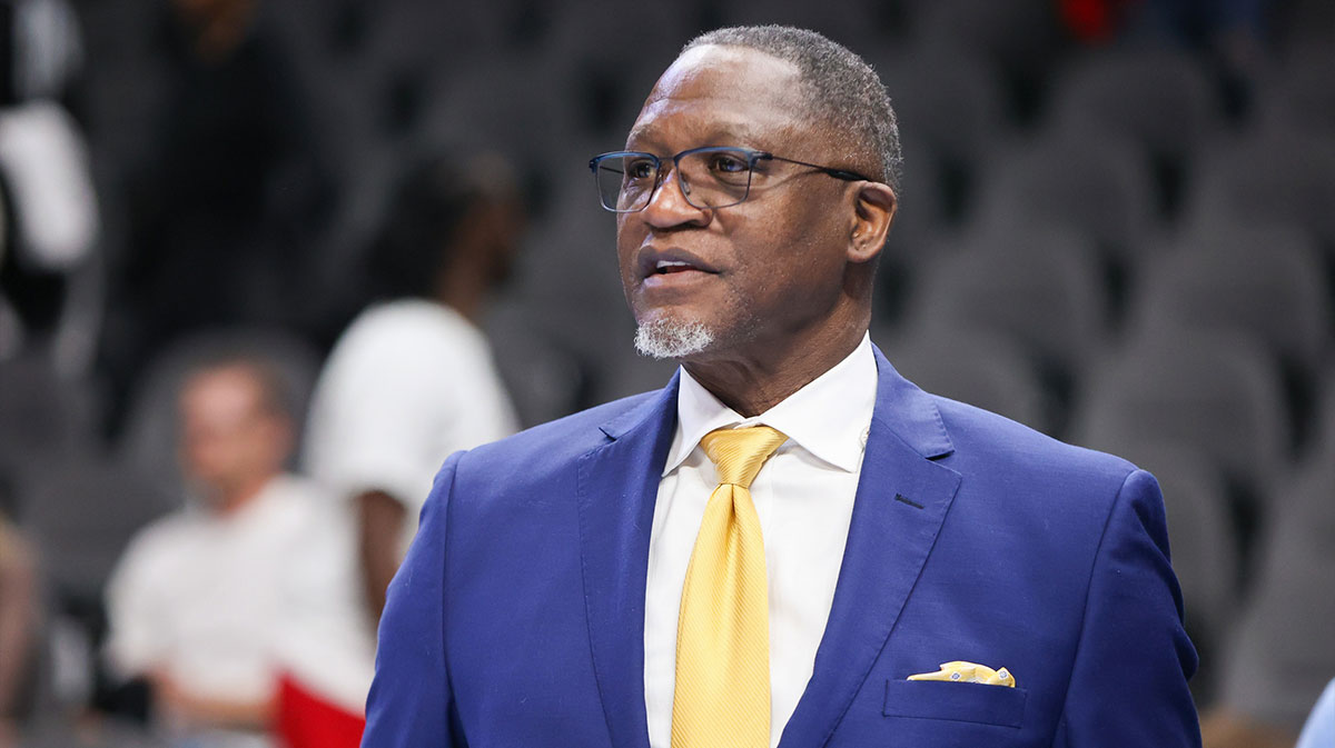 Former Atlanta Hawks forward Dominique Wilkins on the court before a game against the Milwaukee Bucks at State Farm Arena.