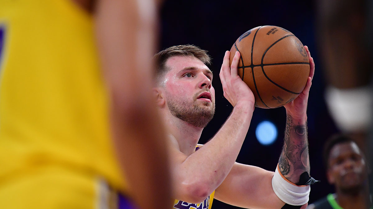 Los Angeles Lakers guard Luka Doncic (77) shoots a free throw against the Minnesota Timberwolves during the first half in game five of first round for the 2025 NBA Playoffs at Crypto.com Arena.