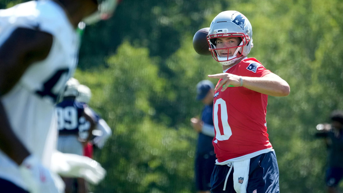 Quarterback Drake Maye throws during practice on the opening day of New England Patriots training camp on July 23, 2025, at Gillette Stadium in Foxboro, Massachusetts.