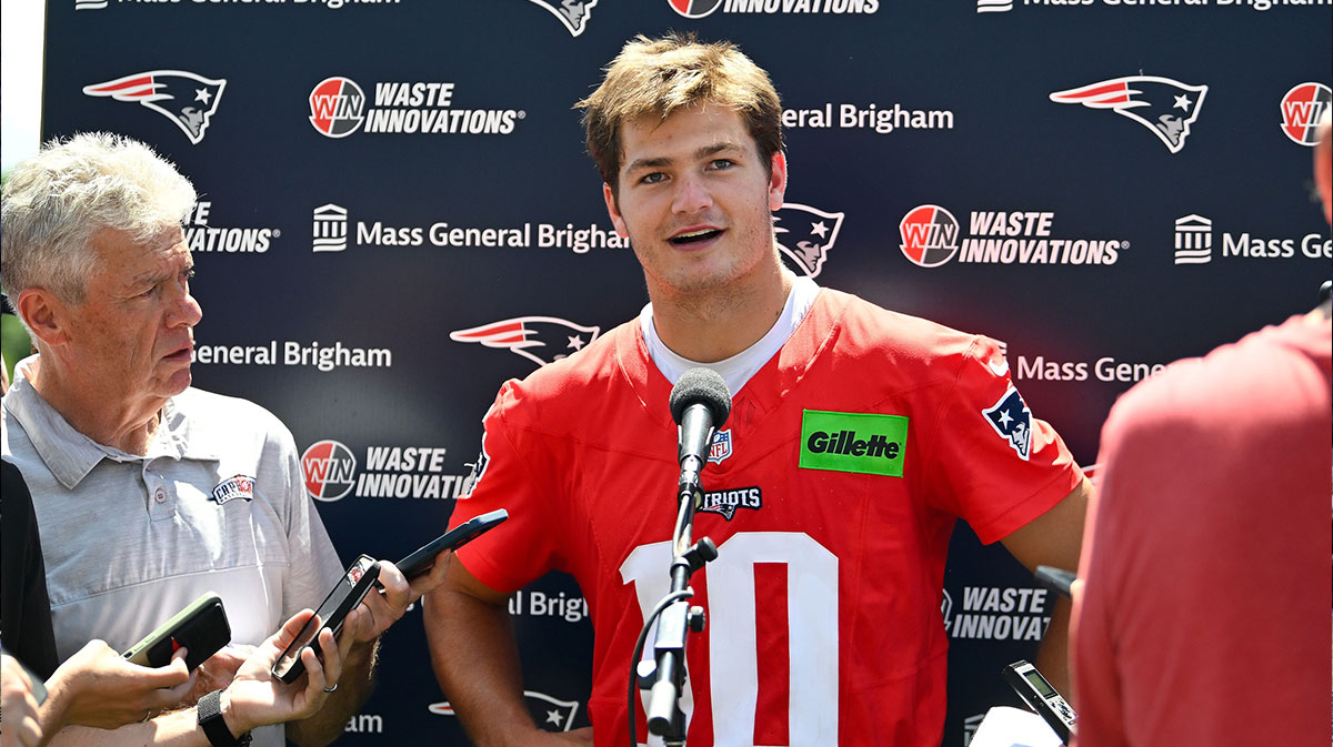 New England Patriots quarterback Drake Maye (10) addresses the media after practice during day one of training camp at Gillette Stadium.