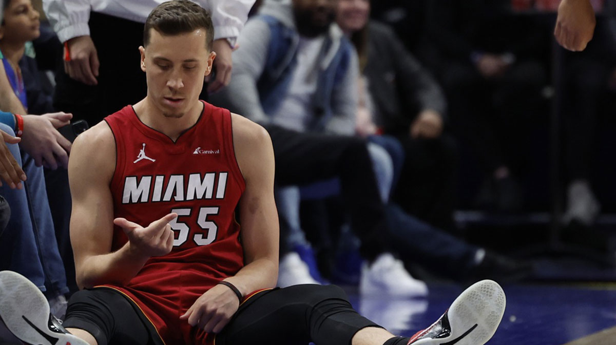 Miami Heat forward Duncan Robinson (55) celebrates after he is fouled on a three point basket in the second half against the Detroit Pistons at Little Caesars Arena.