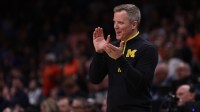 Michigan Wolverines head coach Dusty May in the second half of a South Regional semifinal of the 2025 NCAA tournament against the Auburn Tigers at State Farm Arena