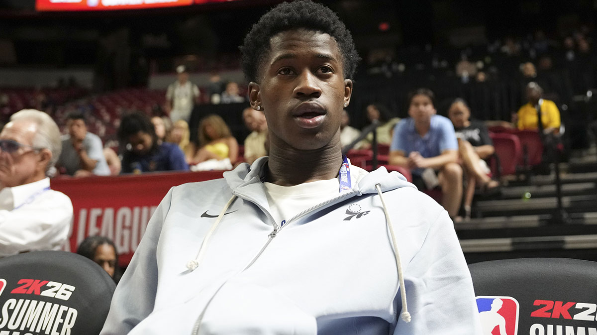 Philadelphia 76ers guard VJ Edgecombe (77) watches the game against the San Antonio Spurs from the baseline at Thomas & Mack Center.