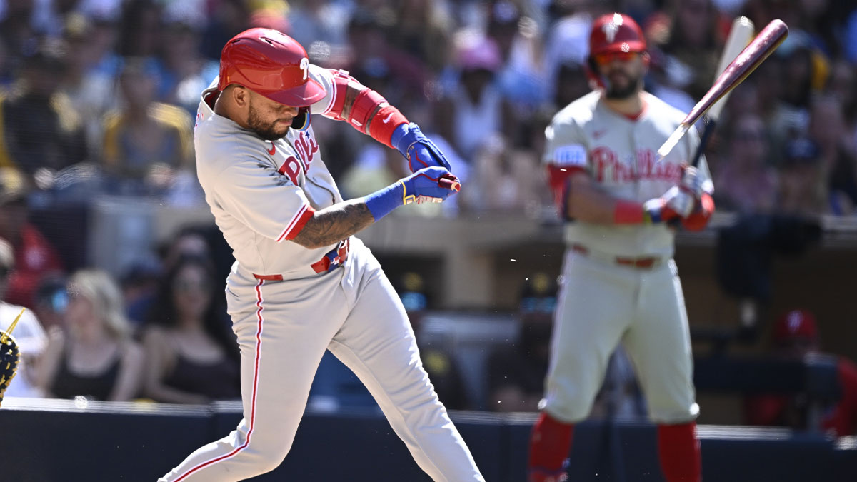 Philadelphia Phillies second baseman Edmundo Sosa (33) breaks his bat as he hits a single during the ninth inning against the San Diego Padres at Petco Park.