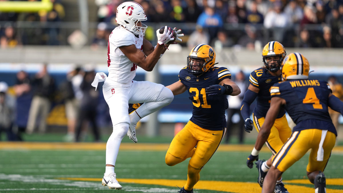 Stanford Cardinal wide receiver Elic Ayomanor (left) catches a pass against California Golden Bears linebacker Hunter Barth (31) during the third quarter at California Memorial Stadium.