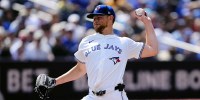 Toronto Blue Jays starting pitcher Eric Lauer (56) pitches to the San Francisco Giants during the third inning at Rogers Centre.