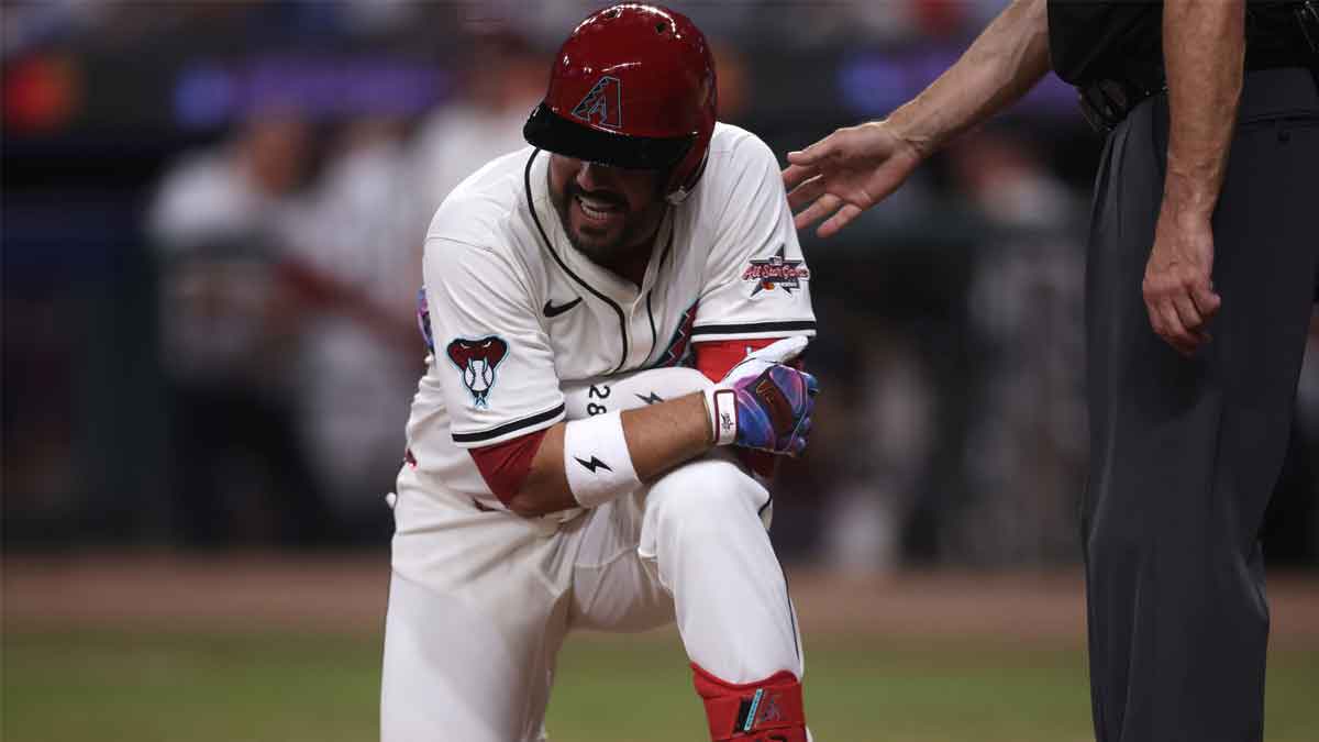 National League third baseman Eugenio Suarez (28) of the Arizona Diamondbacks reacts after getting hit by a pitch in the eighth inning during the 2025 MLB All Star Game at Truist Park.