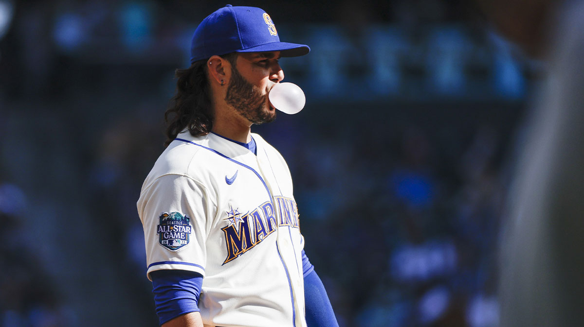 Seattle Mariners third baseman Eugenio Suarez (28) blows a bubble while waiting between pitches against the Texas Rangers during the second inning at T-Mobile Park.