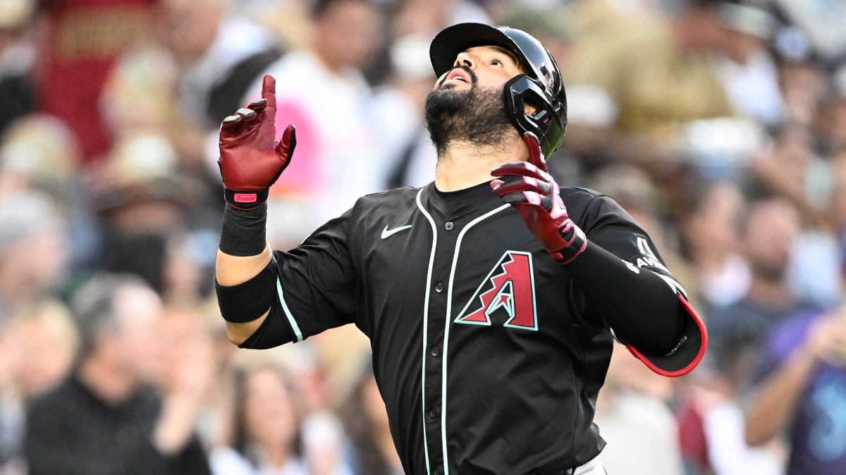 Jul 9, 2025; San Diego, California, USA; Arizona Diamondbacks third baseman Eugenio Suarez (28) points skyward after hitting a solo home run during the fourth inning against the San Diego Padres at Petco Park. Mandatory Credit: Denis Poroy-Imagn Images