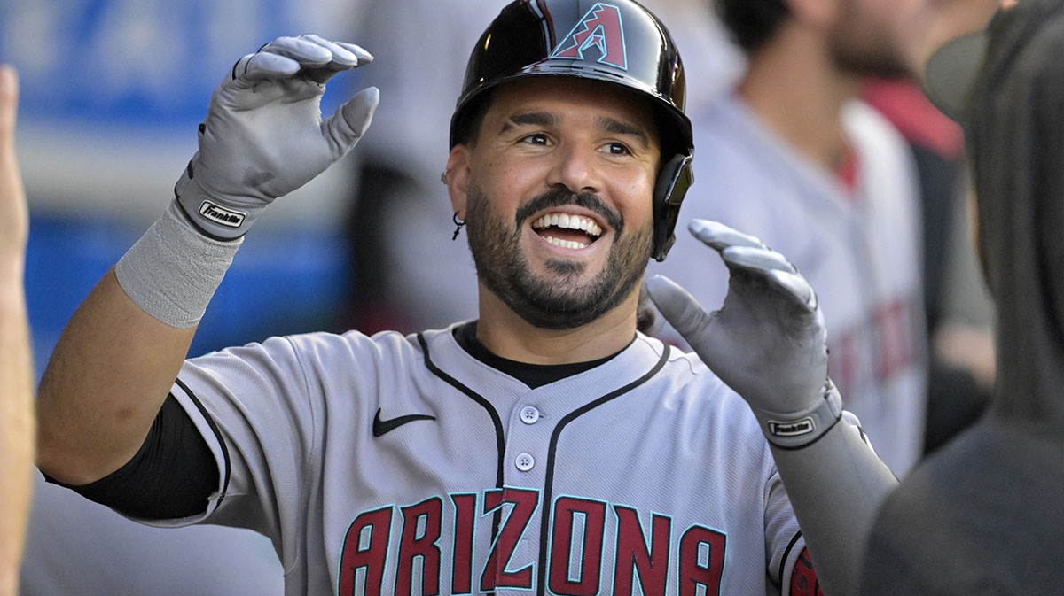 Arizona Diamondbacks third baseman Eugenio Suarez (28) celebrates in the dugout after his second solo home run of the game during the fourth inning against the Los Angeles Angels at Angel Stadium.