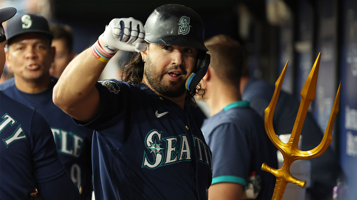 Seattle Mariners third baseman Eugenio Suarez (28) celebrates in the dugout after he hit a home run against the Tampa Bay Rays during the second inning at Tropicana Field.