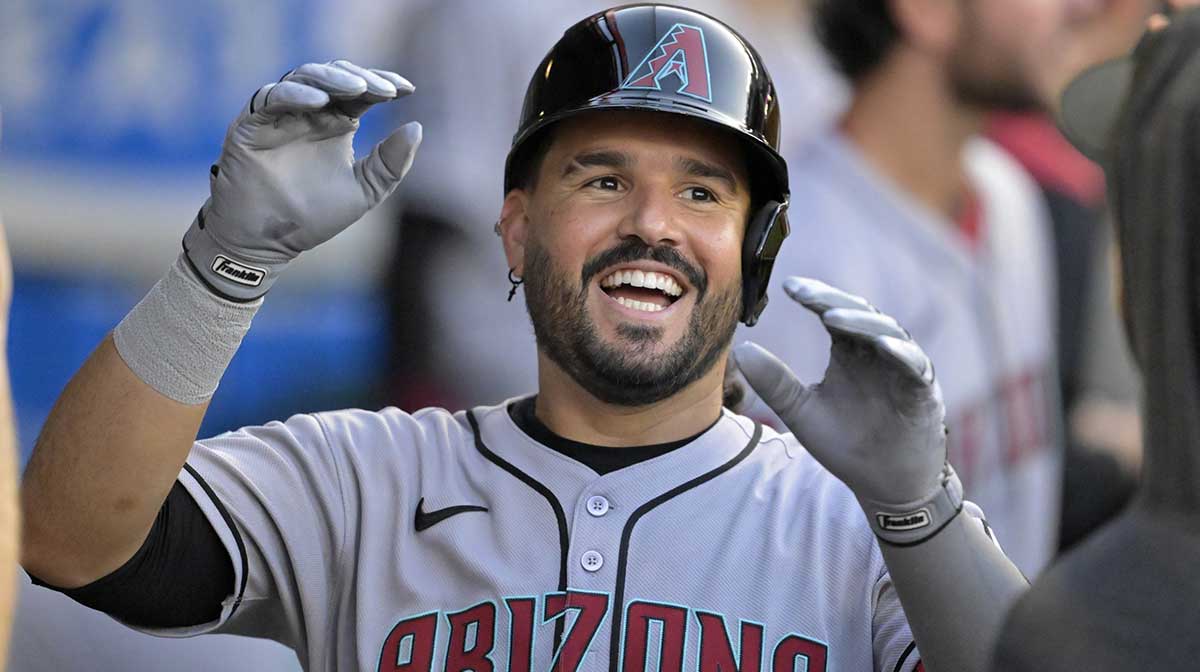 Arizona Diamondbacks third baseman Eugenio Suarez (28) celebrates in the dugout after his second solo home run of the game during the fourth inning against the Los Angeles Angels at Angel Stadium.