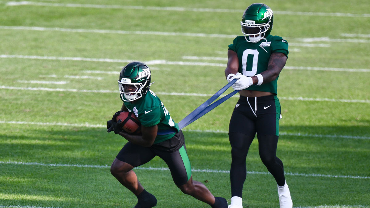 New York Jets running back Zach Evans (38) and running back Braelon Allen (0) participate in a drill during training camp at Atlantic Health Jets Training Center.