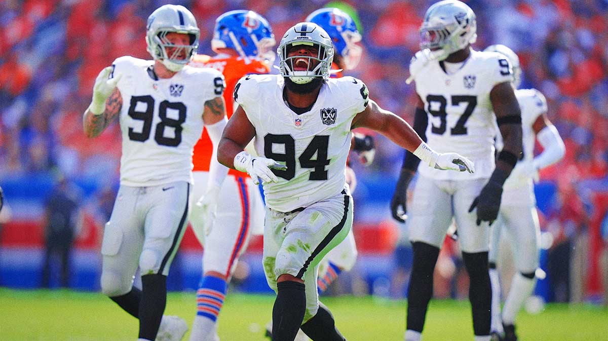 Las Vegas Raiders defensive tackle Christian Wilkins (94) celebrates his sack in the second quarter against the Denver Broncos at Empower Field at Mile High.
