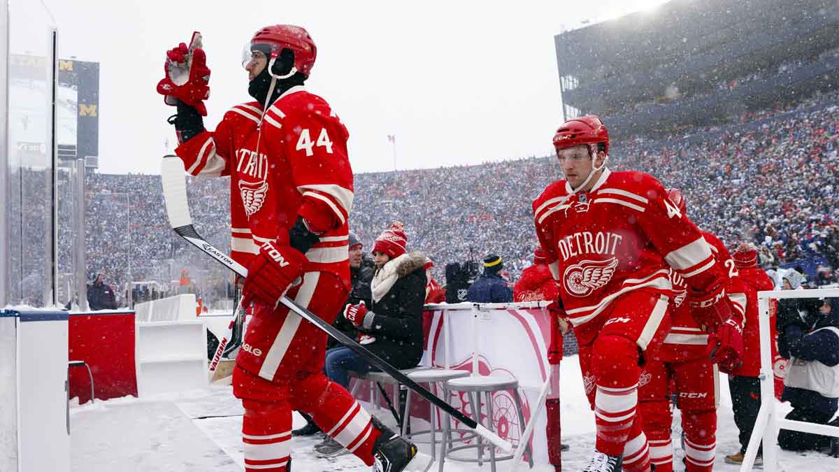 Detroit Red Wings right wing Todd Bertuzzi (44) and right wing Luke Glendening (41) takes the ice before the 2014 Winter Classic hockey game against the Toronto Maple Leafs at Michigan Stadium.