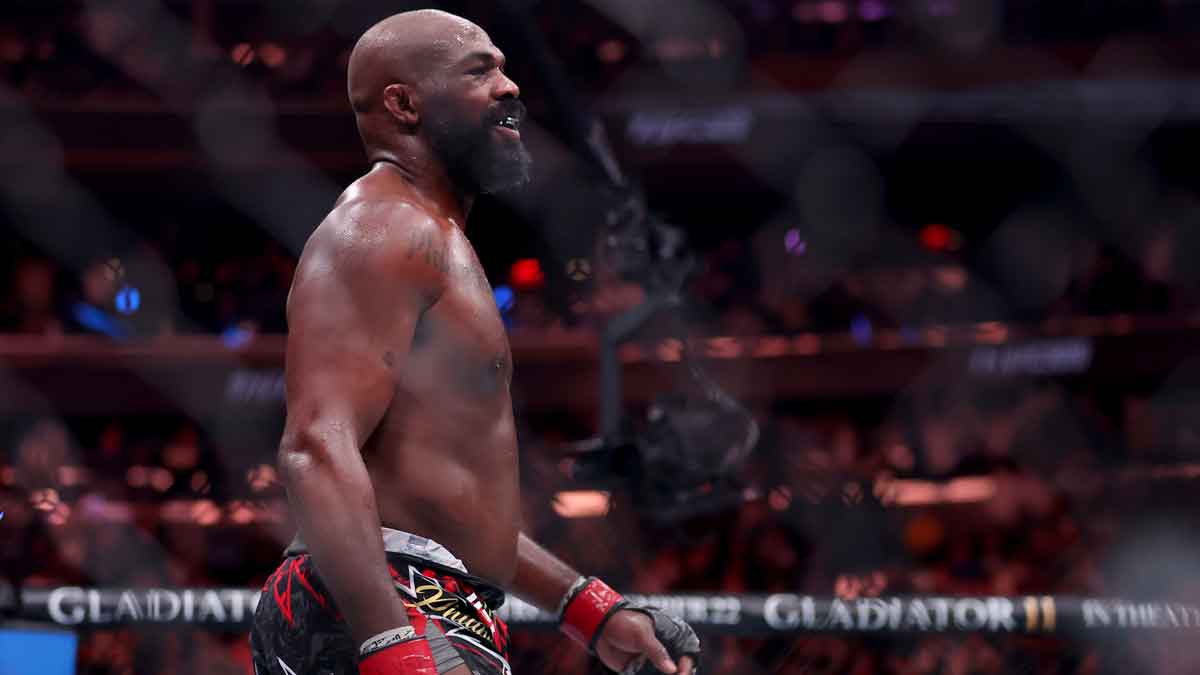Nov 16, 2024; New York, NY, USA; Jon Jones (red gloves) reacts after defeating Stipe Miocic (not pictured) in the heavyweight bout during UFC 309 at Madison Square Garden.