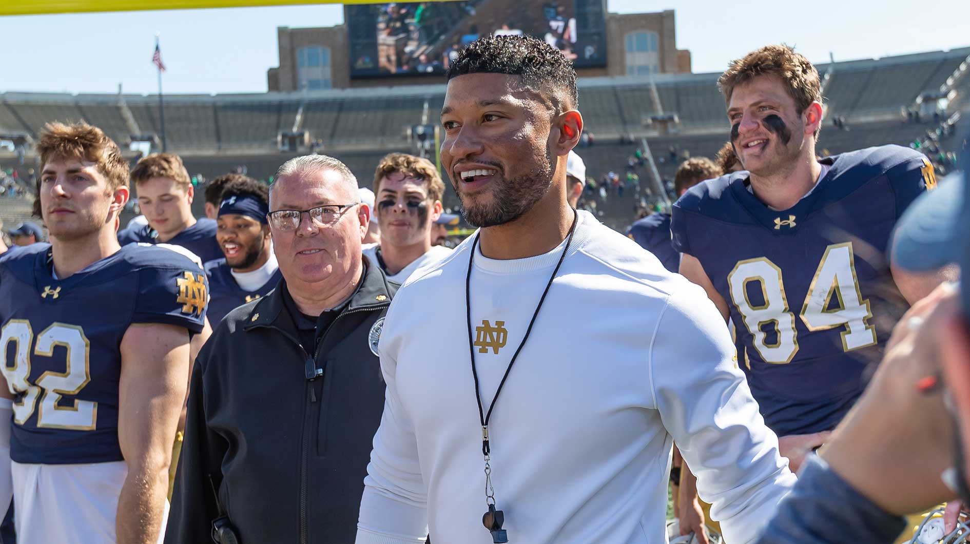 Notre Dame Fighting Irish head coach Marcus Freeman smiles as he walks off the field after the Blue-Gold game at Notre Dame Stadium.