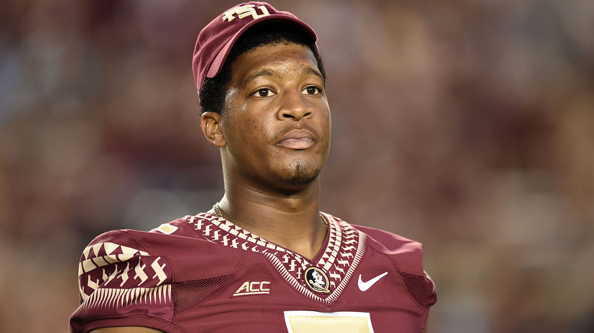 Florida State Seminoles quarterback Jameis Winston (5) who returned to the field after warming up in pads during pre game before their game against the Clemson Tigers at Doak Campbell Stadium. Winston was suspended for Saturday s game against Clemson pending an investigation into some alleged lewd comments he made on campus.