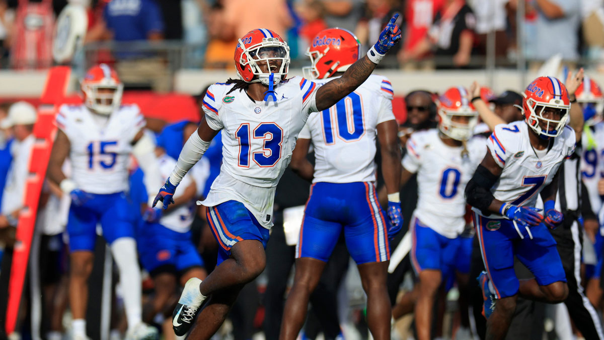 Florida Gators defensive back Aaron Gates (13) celebrates his interception during the second quarter of an NCAA college football matchup Saturday, Nov. 2, 2024 at EverBank Stadium in Jacksonville, Fla. The Georgia Bulldogs defeated the Florida Gators 34-20.