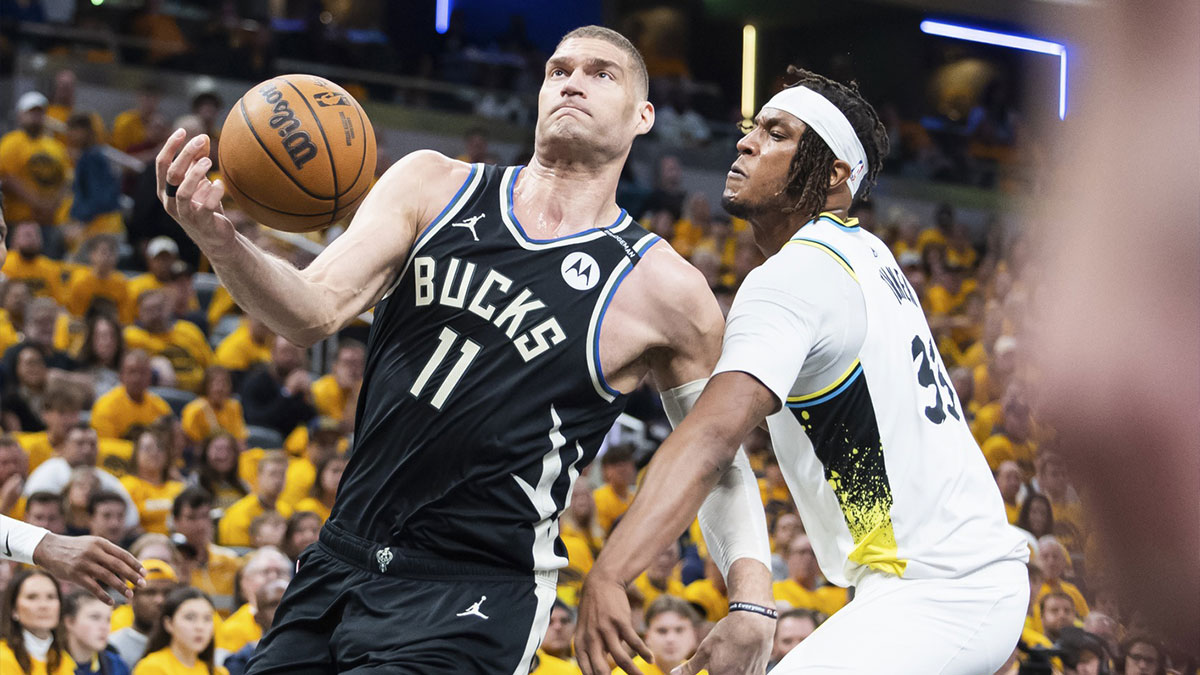 Milwaukee Bucks center Brook Lopez (11) shoots the ball while Indiana Pacers center Myles Turner (33) defends in the first half at Gainbridge Fieldhouse. The Bucks acquired Myles Turner during the NBA Free Agency.