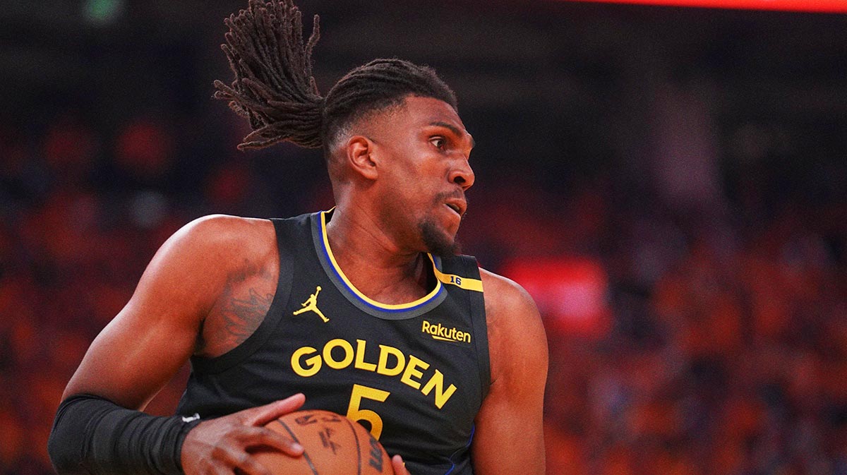 Warriors forward Kevon Looney (5) holds onto a rebound against the Minnesota Timberwolves in the first quarter during game four of the second round for the 2025 NBA Playoffs at Chase Center