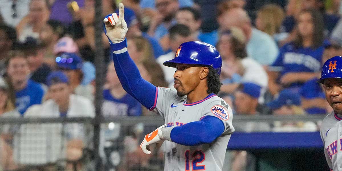 New York Mets shortstop Francisco Lindor (12) celebrates after hitting a single against the Kansas City Royals in the third inning at Kauffman Stadium.