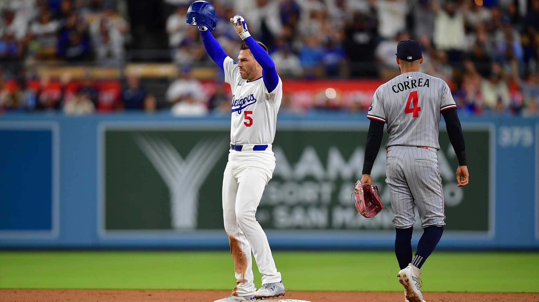 Los Angeles Dodgers first baseman Freddie Freeman (5) reaches second on a double against the Minnesota Twins during the sixth inning at Dodger Stadium.