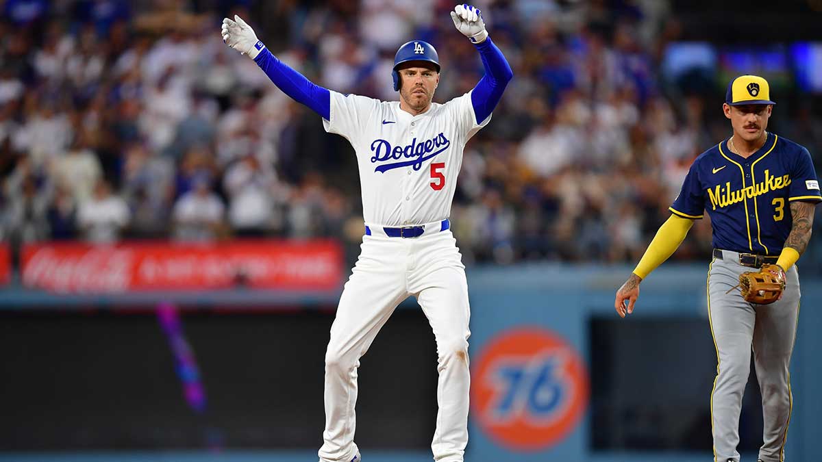 Los Angeles Dodgers first baseman Freddie Freeman (5) reaches second on a double against the Milwaukee Brewers during the fifth inning at Dodger Stadium.