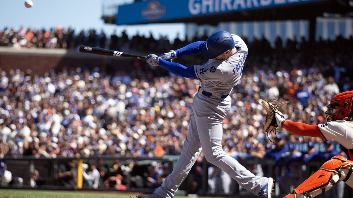 Los Angeles Dodgers first baseman Freddie Freeman (5) connects for an RBI single against the San Francisco Giants during the 11th inning at Oracle Park.