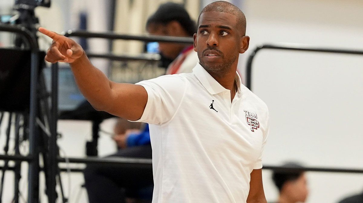 NBA player Chris Paul looks on as Team CP3 plays a game against Nightrydas at Nike EYBL at the Memphis Sports & Events Center