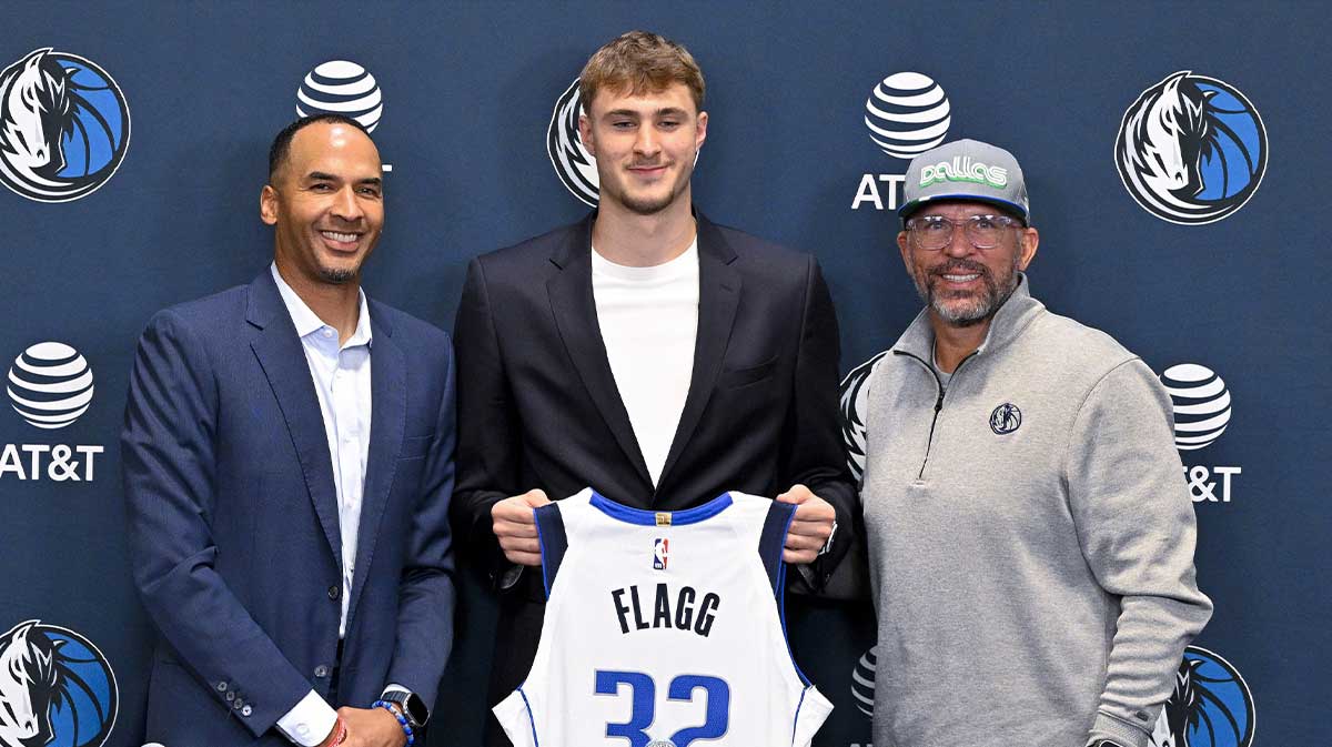 Dallas Mavericks general manager Nico Harrison and Mavericks first overall pick Cooper Flagg and head coach Jason Kidd pose for a photo at the Dallas Mavericks Practice Facility. 