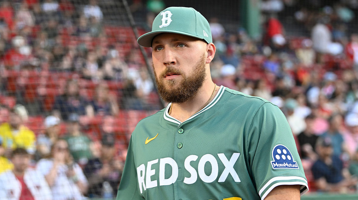 Boston Red Sox starting pitcher Garrett Crochet (35) walks out of the dugout before the start of a game against the Atlanta Braves at Fenway Park.