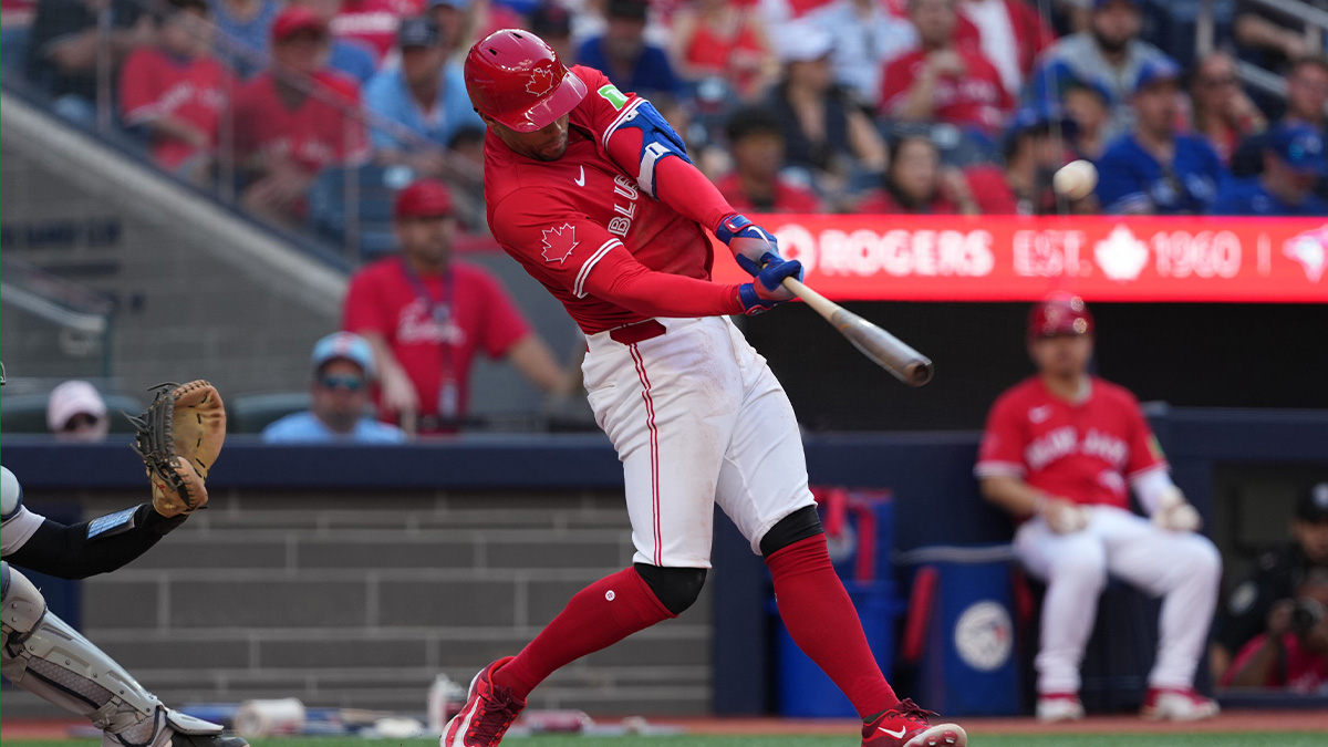 Toronto Blue Jays right fielder George Springer (4) hits a grand slam hone run against the New York Yankees during the seventh inning at Rogers Centre.