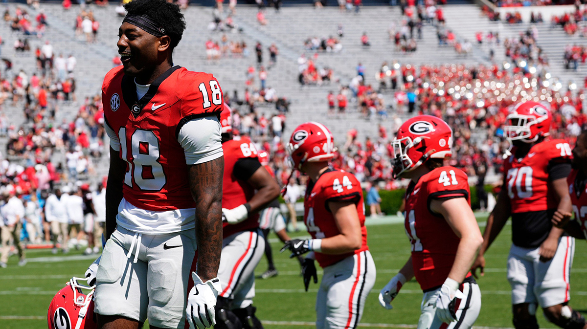 Georgia wide receiver Sacovie White (18) celebrates with his teammates after the Georgia G-Day spring football game in Athens, Ga., on Saturday, April 12, 2025.