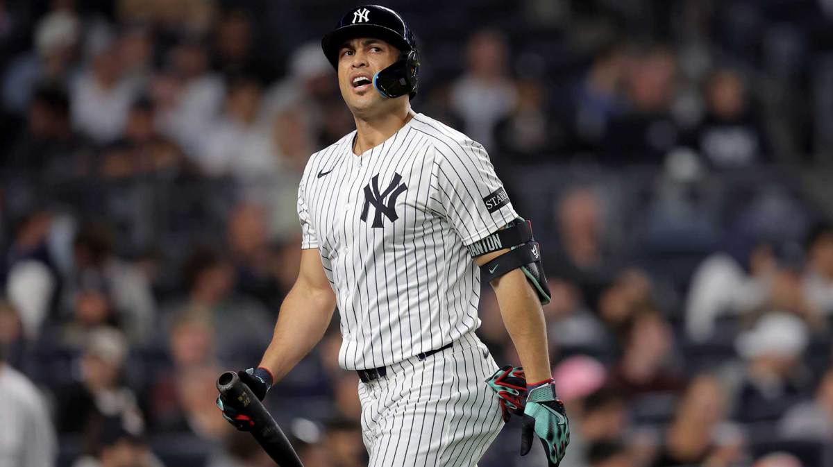 New York Yankees designated hitter Giancarlo Stanton (27) reacts after striking out against the Los Angeles Angels to end the sixth inning at Yankee Stadium.