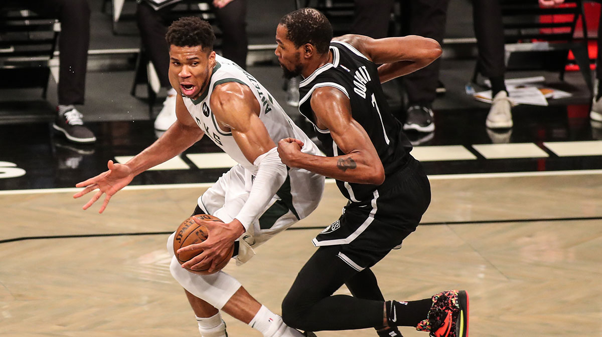 Milwaukee Bucks forward Giannis Antetokounmpo (34) and Brooklyn Nets forward Kevin Durant (7) during game seven in the second round of the 2021 NBA Playoffs at Barclays Center.