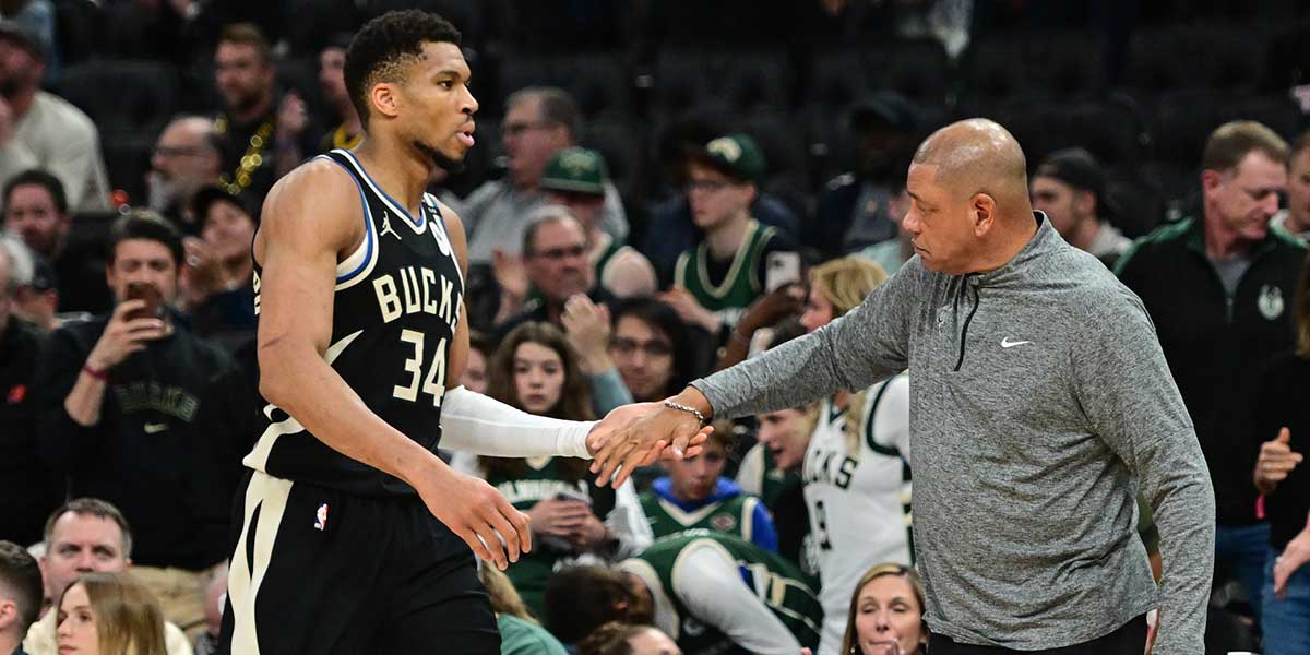 Milwaukee Bucks forward Giannis Antetokounmpo (34) exits the game in the fourth quarter as head coach Doc Rivers shakes his hand during game four against the Indiana Pacers of first round for the 2024 NBA Playoffs at Fiserv Forum.