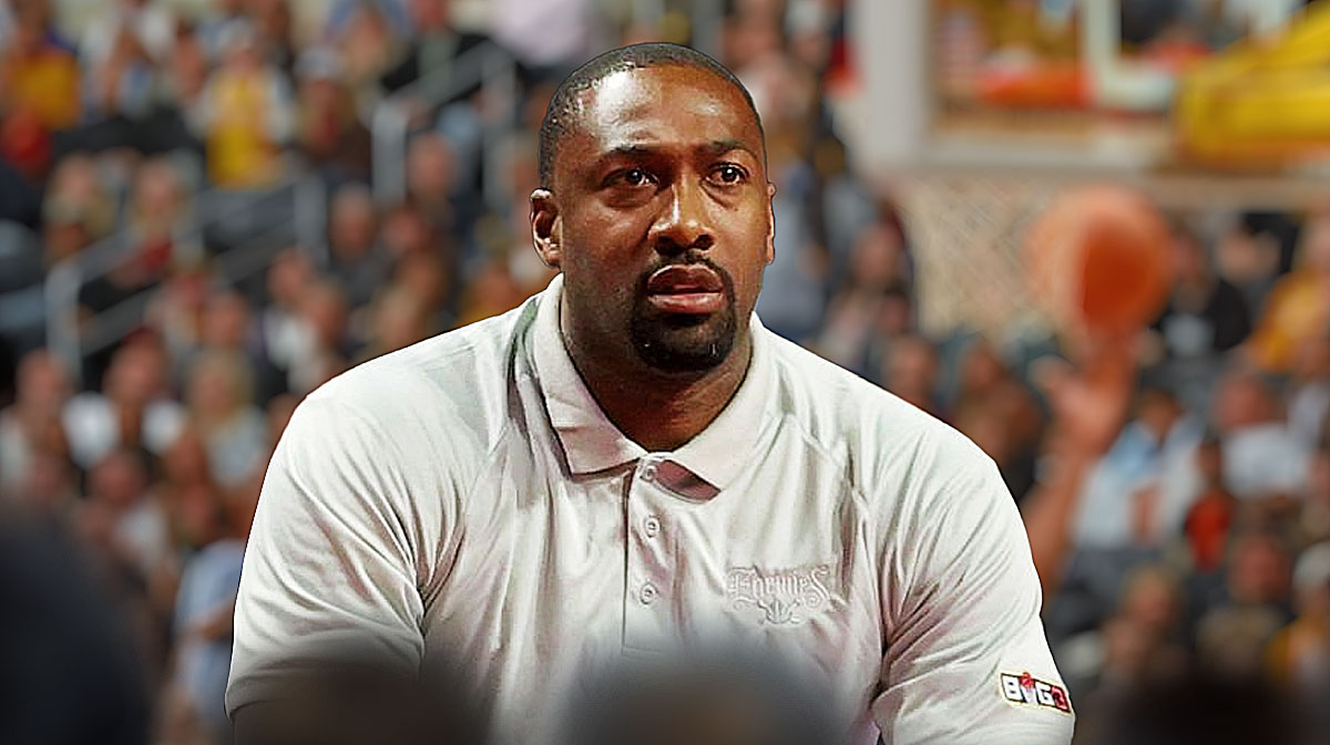 Gilbert Arenas looking stern, basketball court in background.